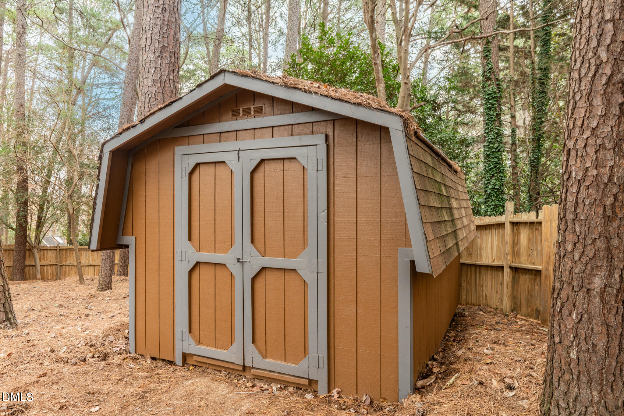 6604 Winding Trail Raleigh, NC 27612 - Photo 48 of 49 a front view of a house with garden