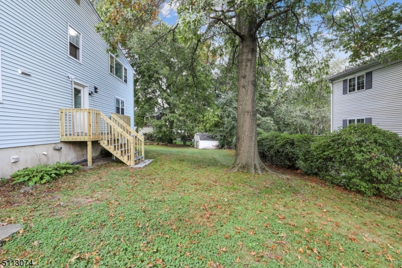 2 Center Street Madison, NJ 07940 - Photo 16 of 18 a view of a house with a yard