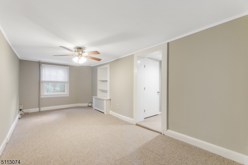 2 Center Street Madison, NJ 07940 - Photo 7 of 18 a view of an empty room with a window