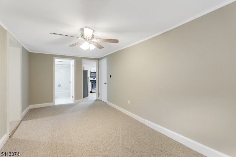 2 Center Street Madison, NJ 07940 - Photo 8 of 18 a view of an empty room with a ceiling fan