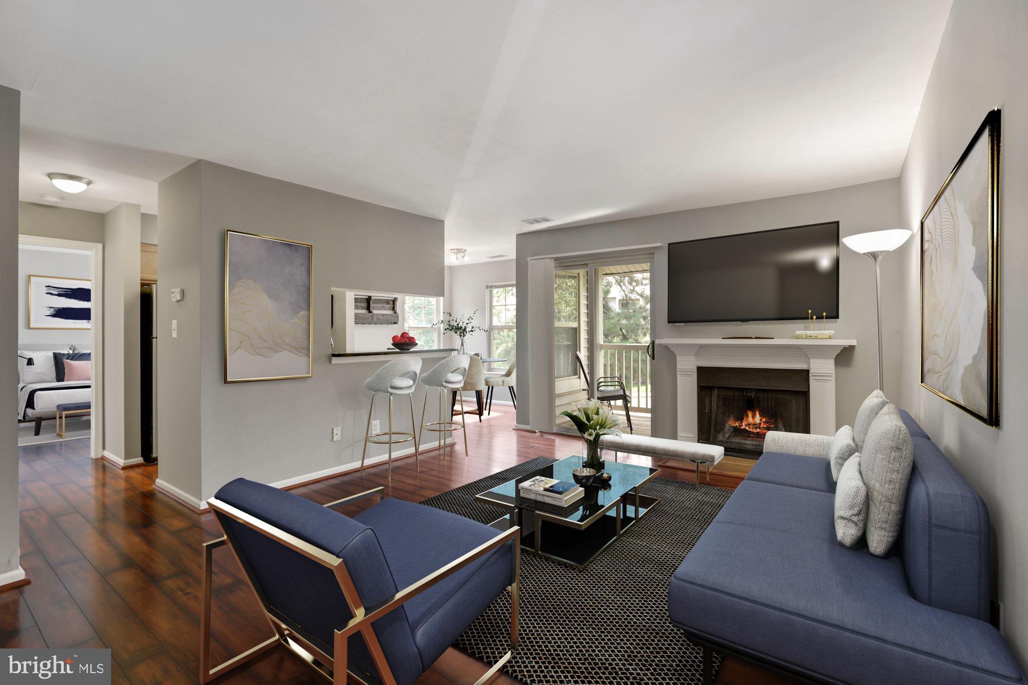 Living room with wood burning fireplace
