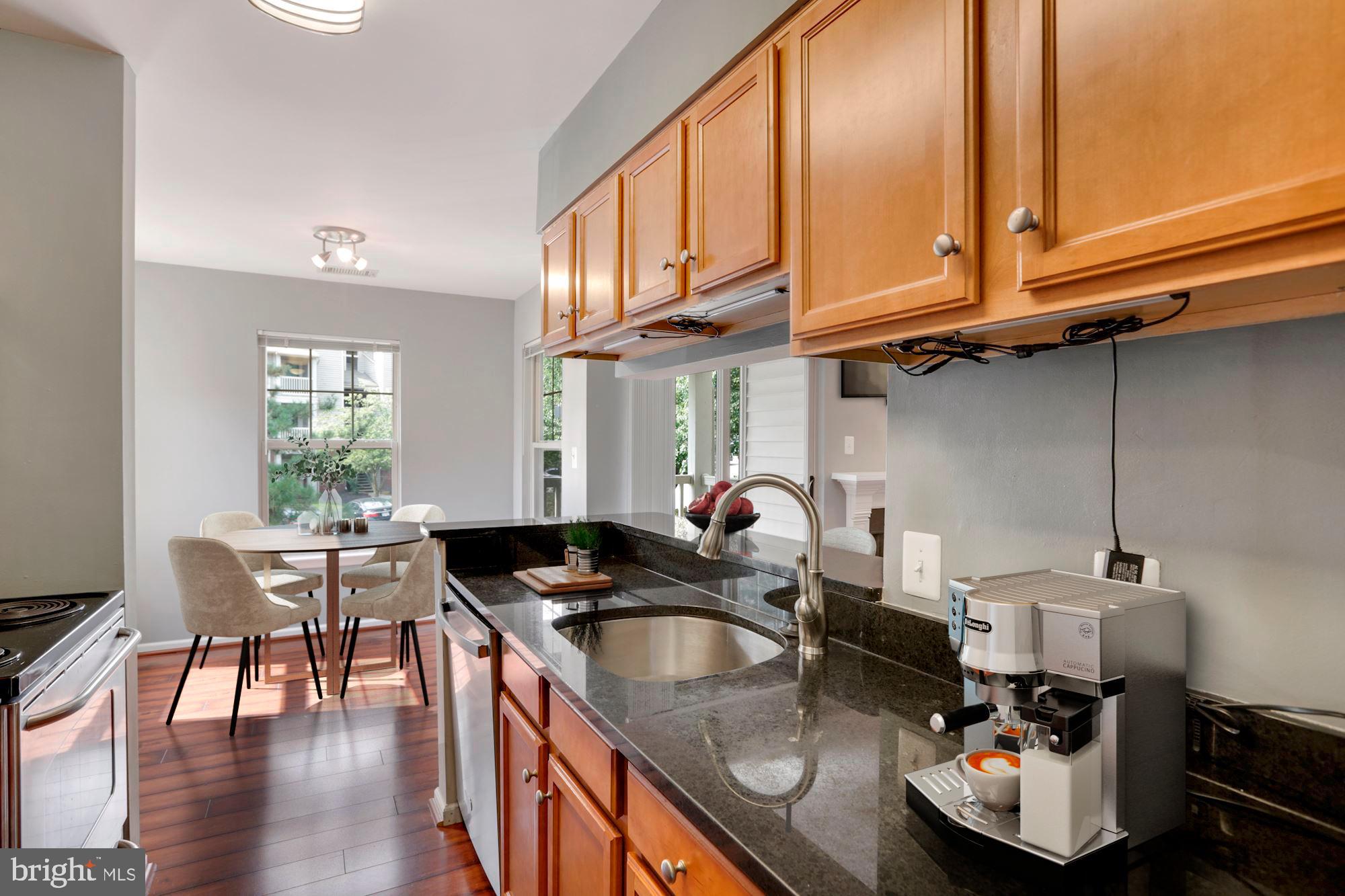 Kitchen opens to dining room