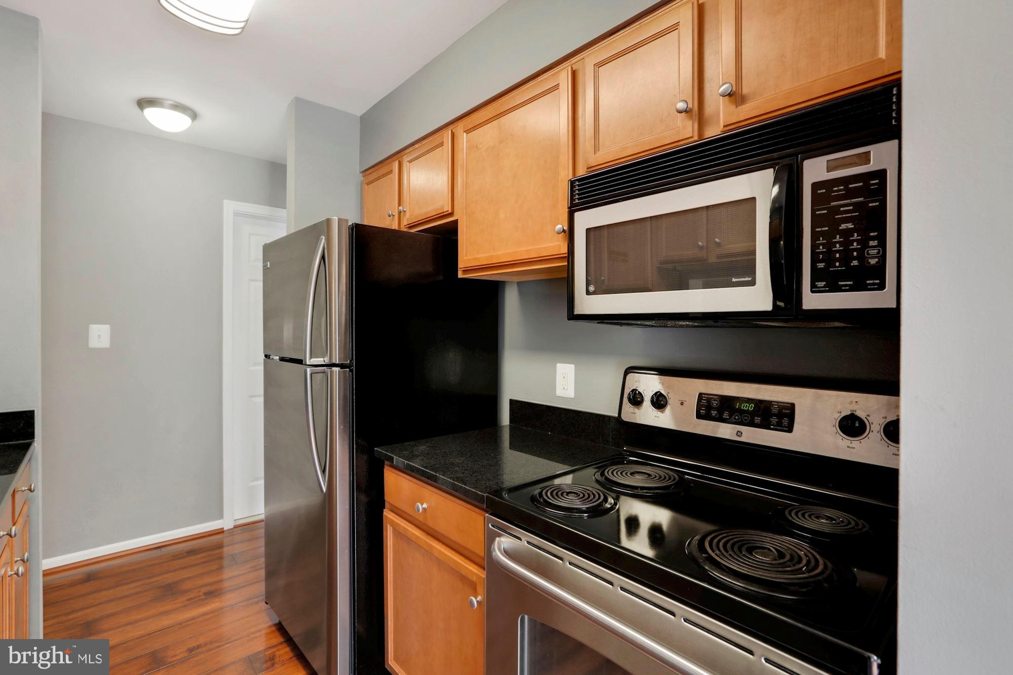 11659 Chesterfield Court, Unit D Reston, VA 20190 - Photo 8 of 28 Kitchen leading to hallway