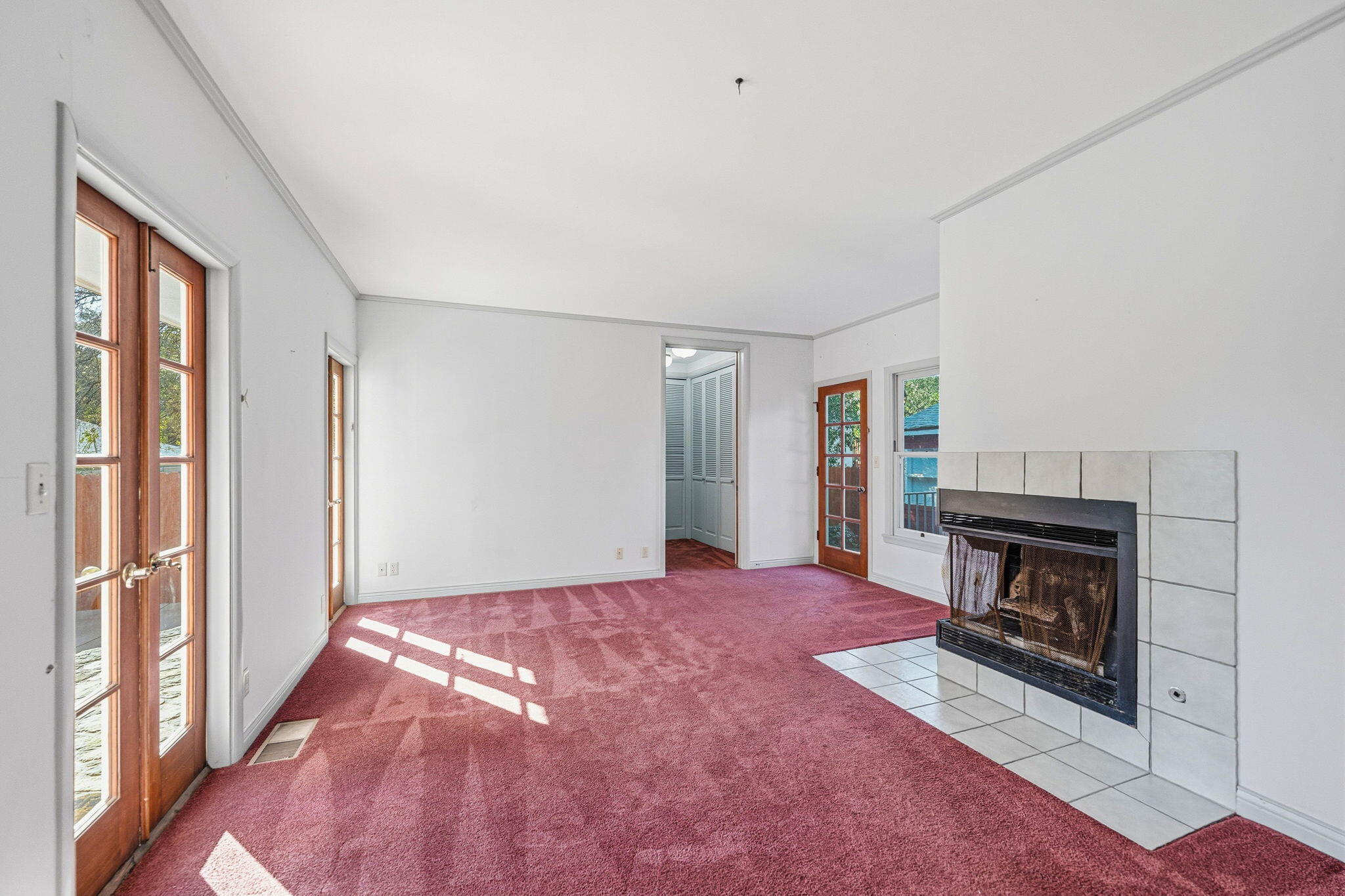 1225 Say Road Santa Paula, CA 93060 - Photo 19 of 45 a view of an empty room with a fireplace and a window