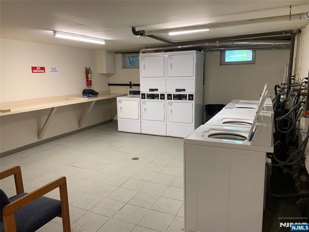 153 Park Avenue, Unit 153C Park Ridge, NJ 07656 - Photo 5 of 21 a kitchen with storage and utility