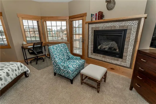 a bathroom with a double vanity sink mirror and bathtub