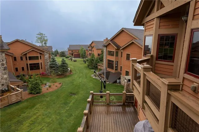 a view of a deck with couches table and chairs
