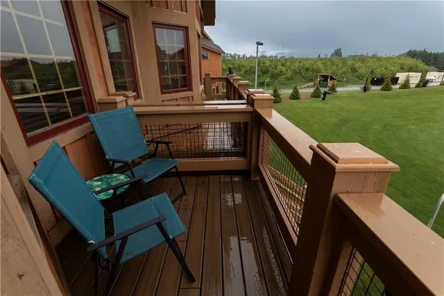 a view of balcony with wooden floor and deck