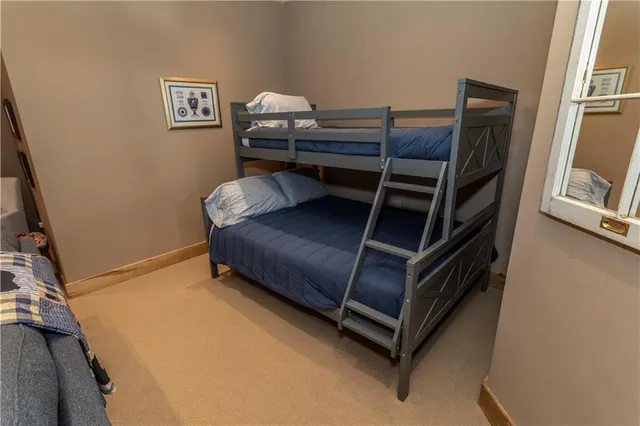 a living room with furniture fireplace and flat screen tv
