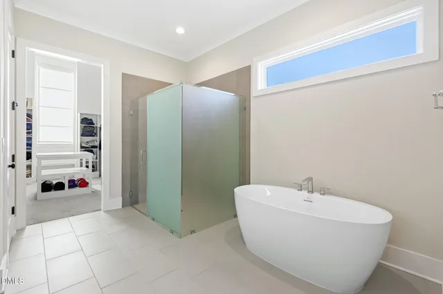 a bedroom with a bed furniture and a window