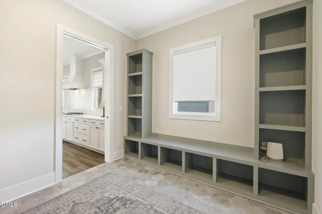 a bathroom with a sink vanity and a mirror
