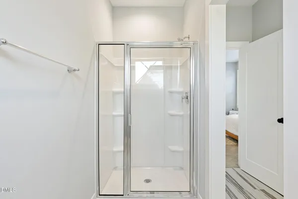 a room with gym equipment and a window