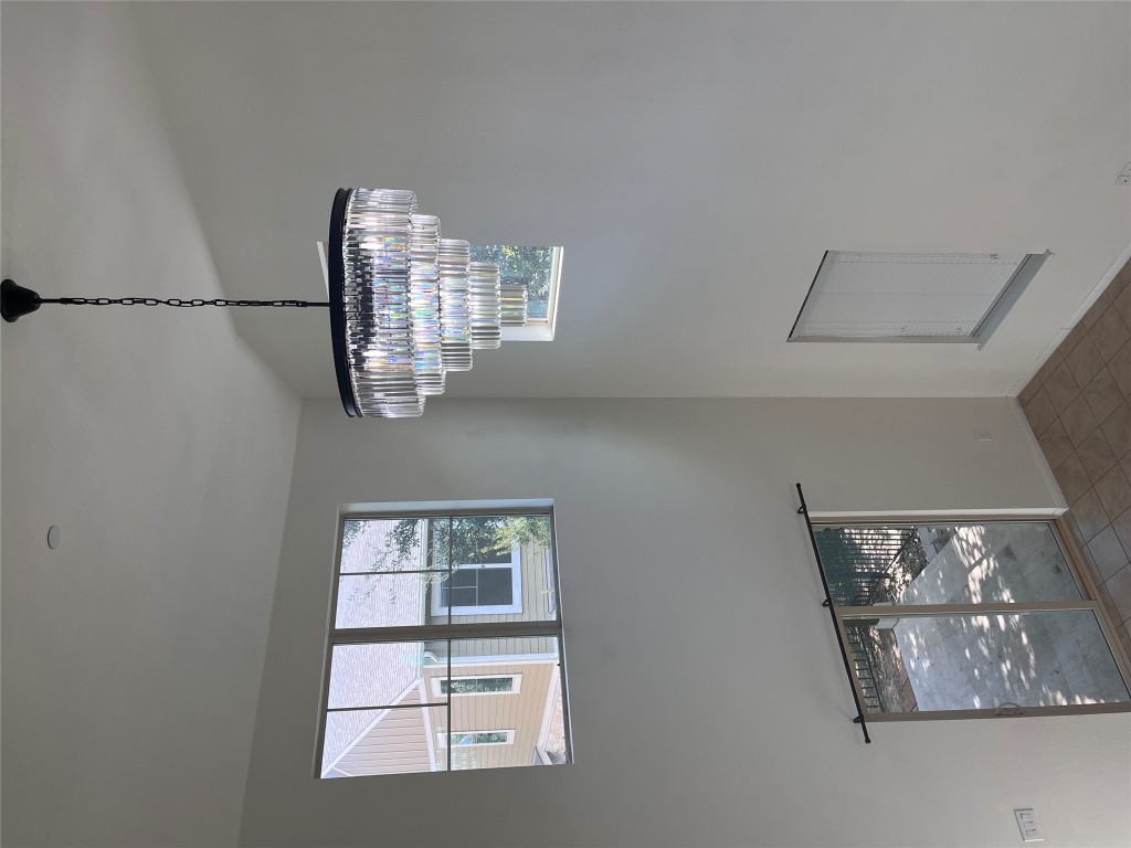 516 East Slaughter Lane, Unit 1404 Austin, TX 78744 - Photo 2 of 17 a view of a decorative light in a room