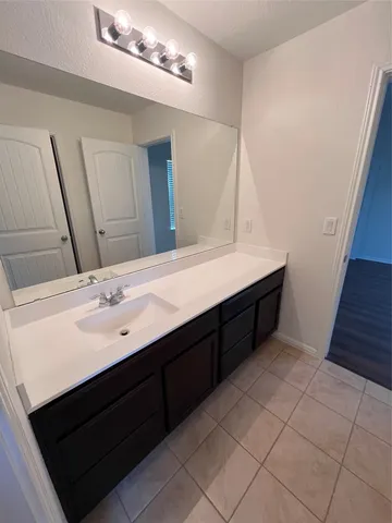 a bathroom with a toilet and a bathtub