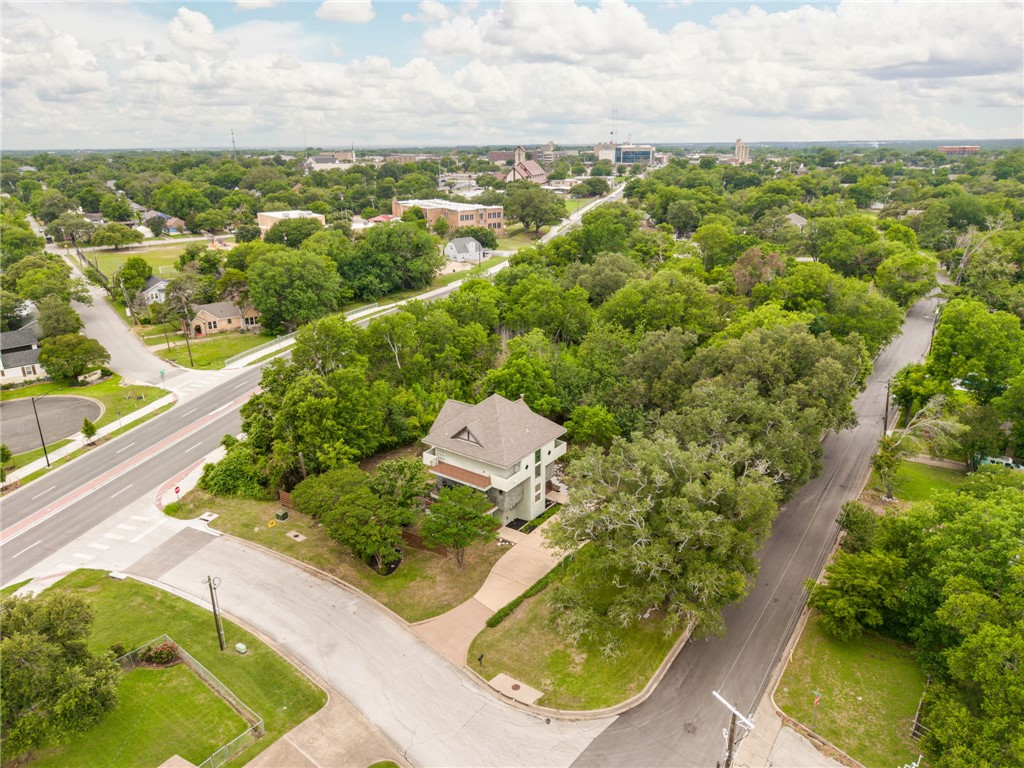1015 East 24th Street Bryan, TX 77803 - Photo 39 of 43 an aerial view of residential houses with outdoor space and trees