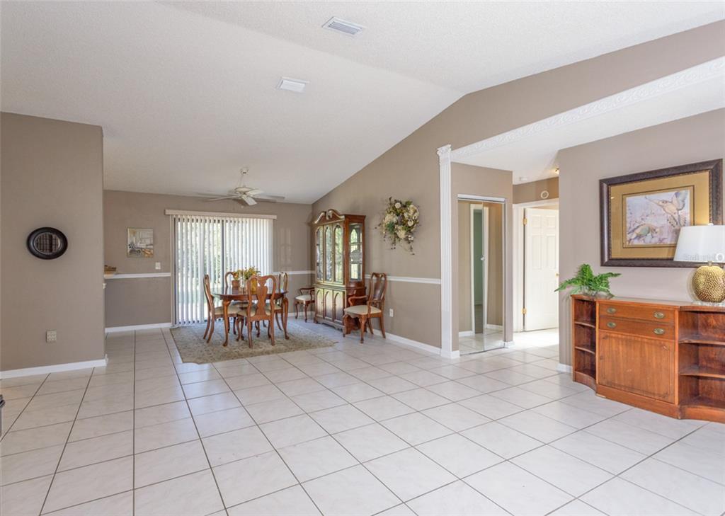 22 Westfield Lane Palm Coast, FL 32164 - Photo 11 of 47 a view of a livingroom with furniture and white doors
