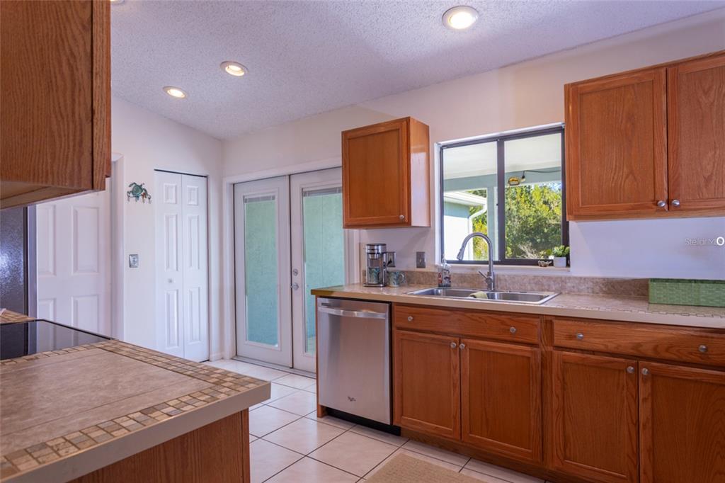 22 Westfield Lane Palm Coast, FL 32164 - Photo 18 of 47 a kitchen with a sink cabinets and window