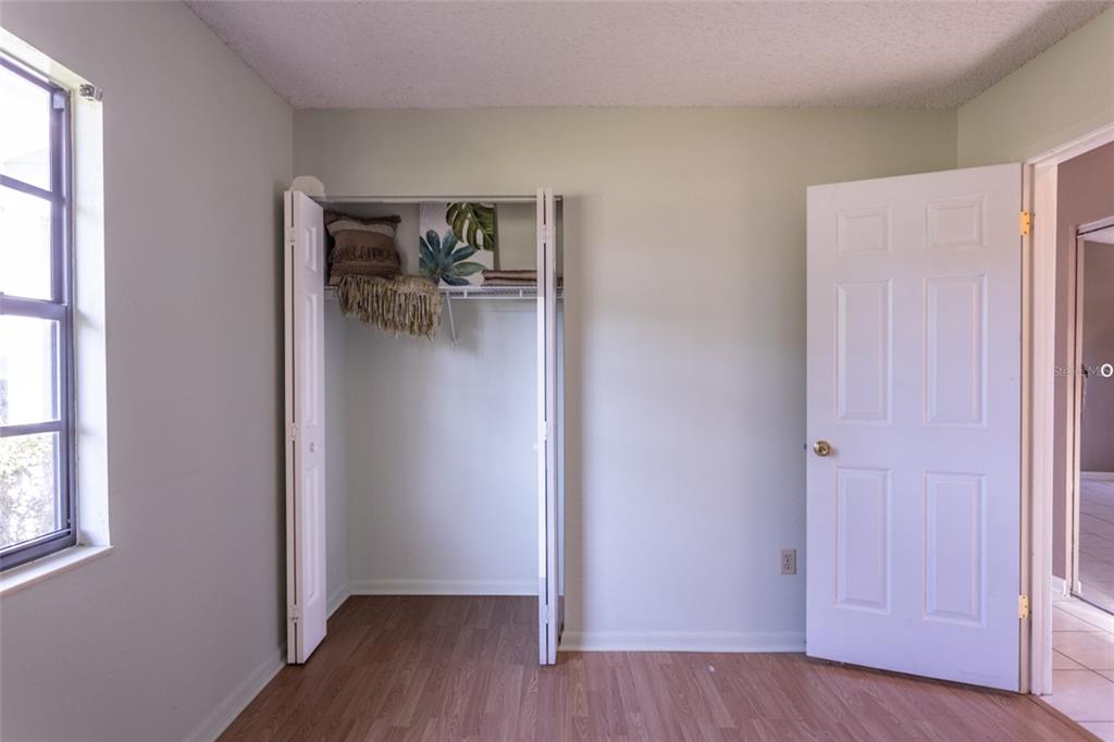 22 Westfield Lane Palm Coast, FL 32164 - Photo 36 of 47 a view of empty room with wooden floor