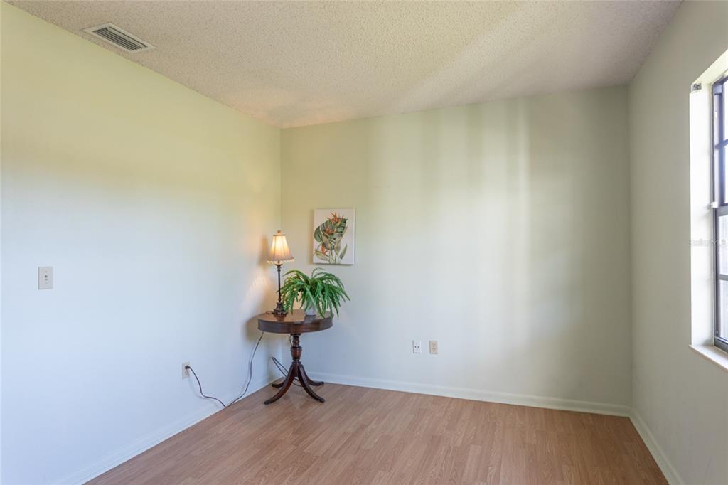 22 Westfield Lane Palm Coast, FL 32164 - Photo 37 of 47 a view of room with hardwood floor and window