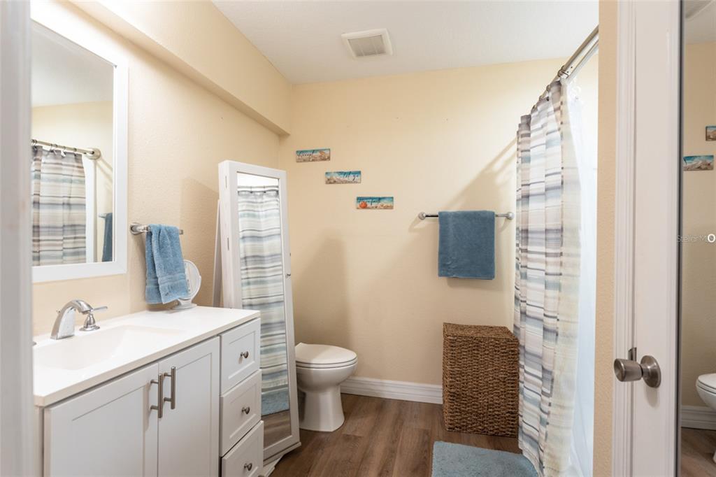 22 Westfield Lane Palm Coast, FL 32164 - Photo 43 of 47 a bathroom with a sink toilet and shower