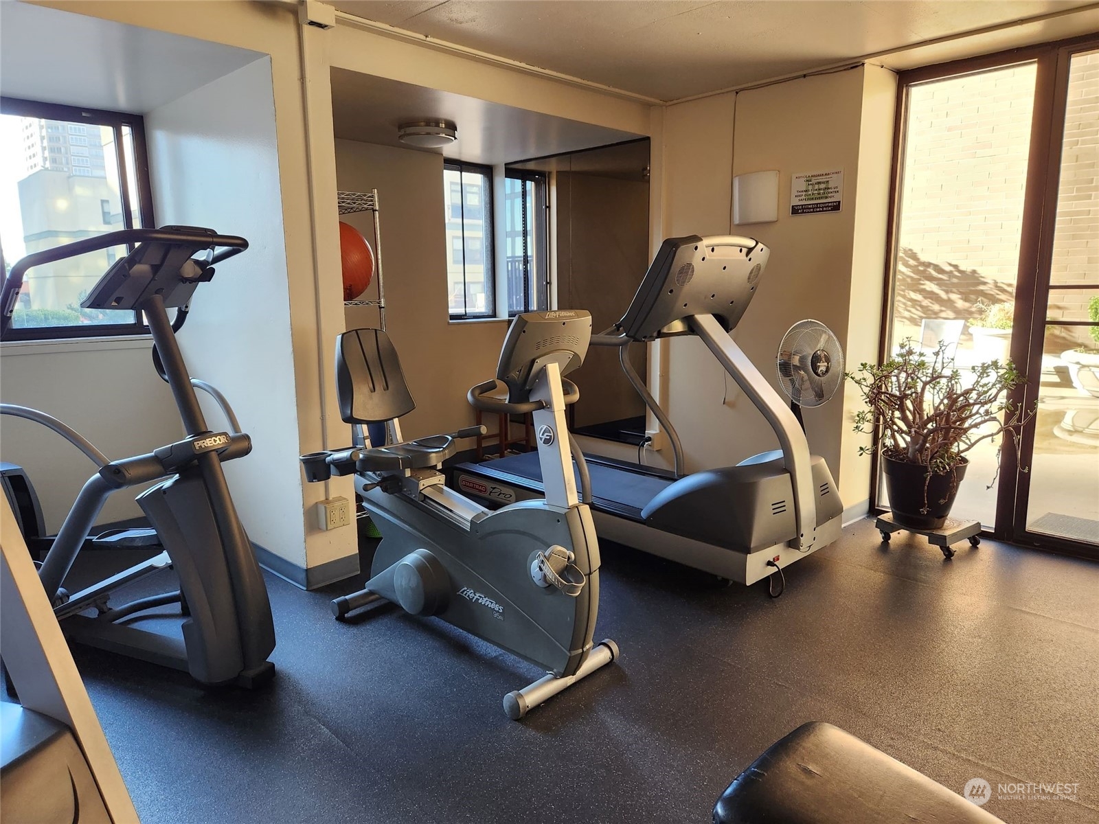 2100 3rd Avenue, Unit 2106 Seattle, WA 98121 - Photo 12 of 25 a view of a room with gym equipment