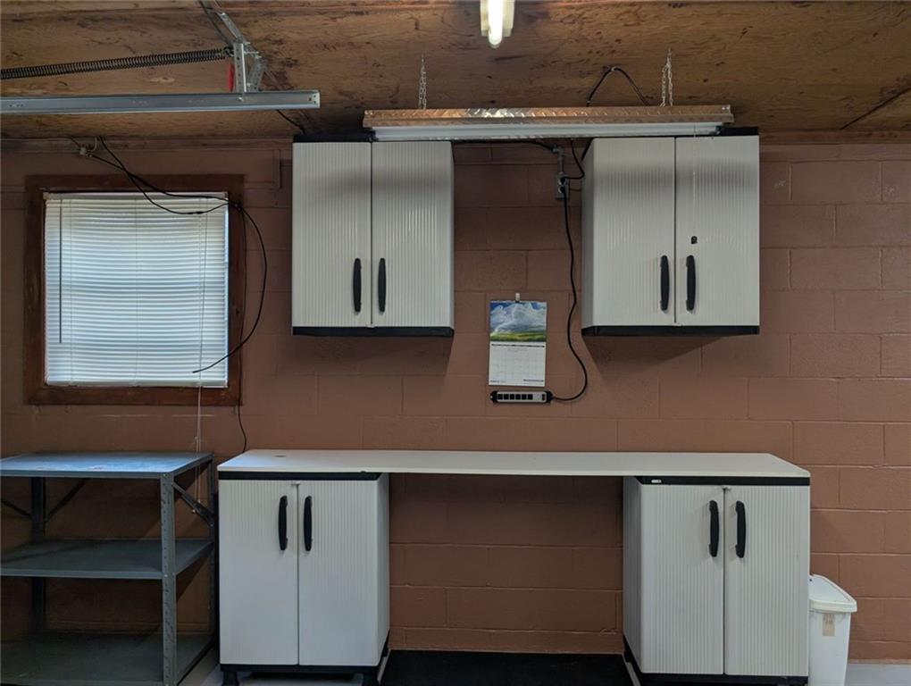 109 7th Street Carrollton, GA 30117 - Photo 17 of 19 a kitchen with a refrigerator and cabinets