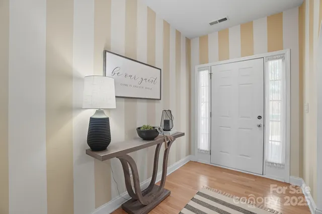 a view of a kitchen with appliances and cabinets
