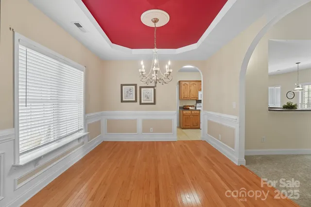 a view of a livingroom with wooden floor