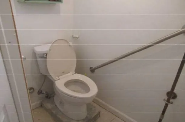 a close view of a toilet in a bathroom