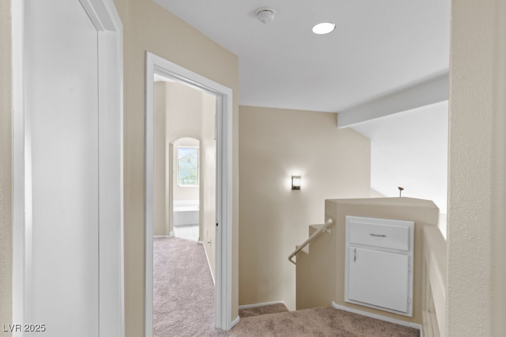 5309 West Camino Del Rancho Las Vegas, NV 89130 - Photo 23 of 41 Corridor with an upstairs landing and carpet flooring