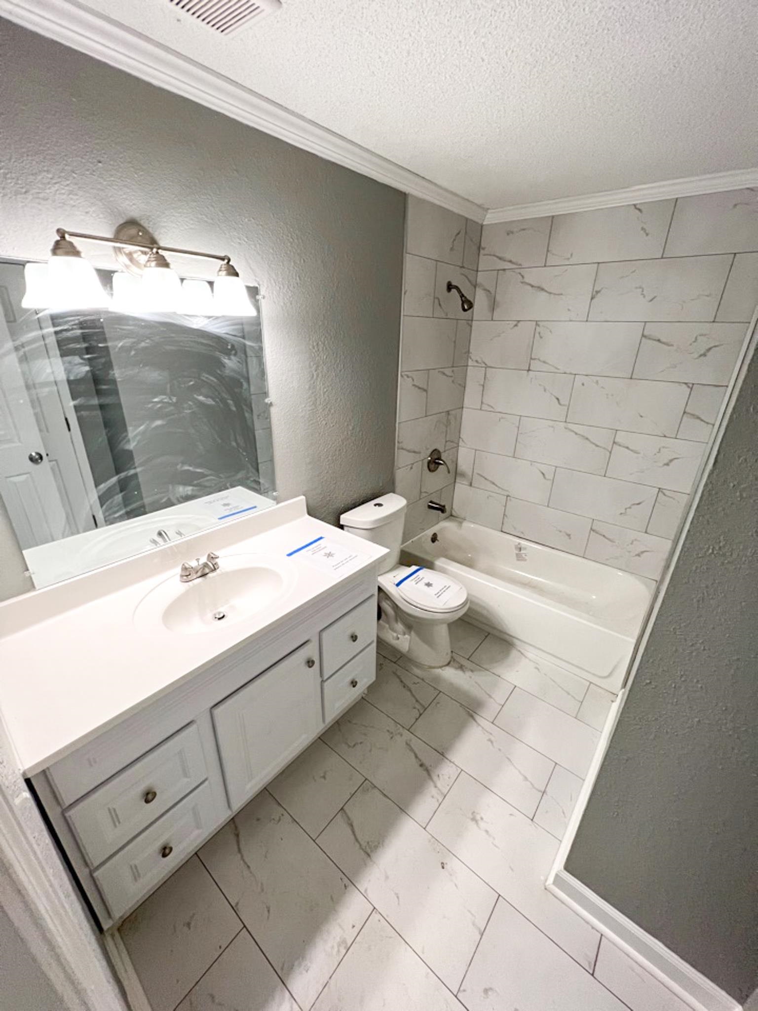 7108 Farmhouse Drive Memphis, TN 38125 - Photo 17 of 21 a bathroom with a sink double vanity and a mirror