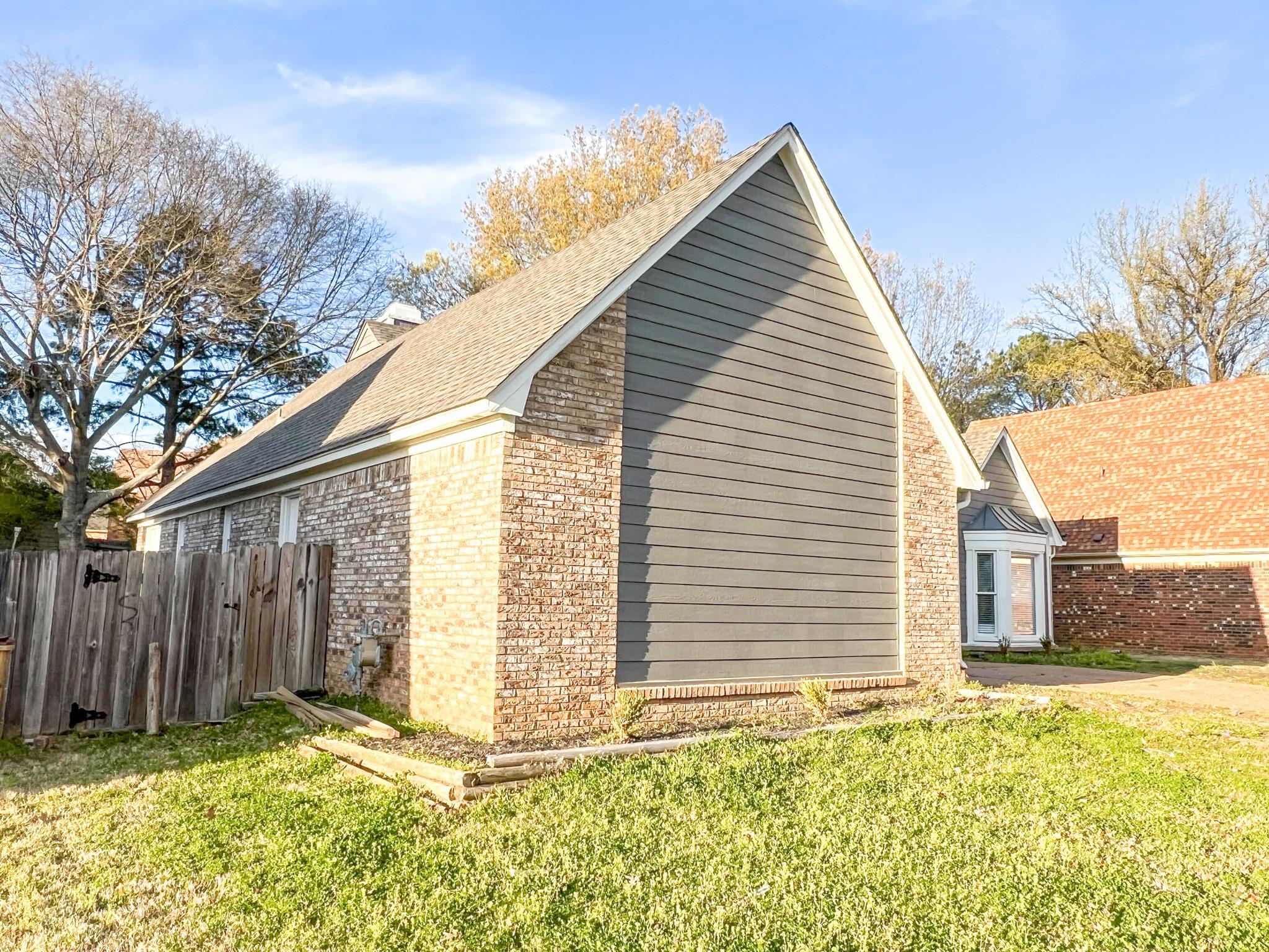 7108 Farmhouse Drive Memphis, TN 38125 - Photo 3 of 21 a view of backyard of house