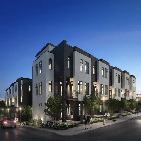 a city street lined with tall buildings