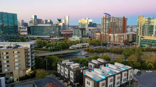 a view of a city with tall buildings