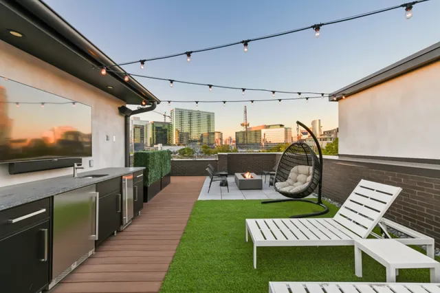 a view of a patio with couches chairs and a table