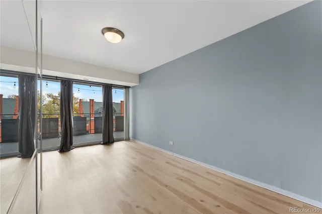 a view of a room with a large window