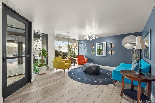 a living room with furniture and a table