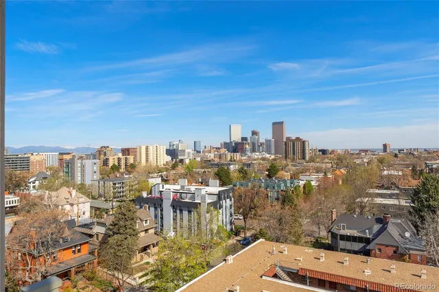 a view of a building with a street