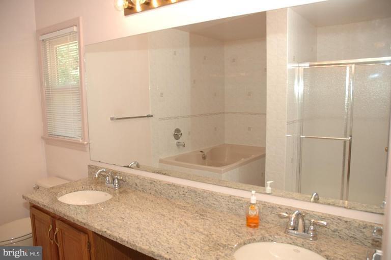7722 Huntsman Boulevard Springfield, VA 22153 - Photo 5 of 23 Master Bath