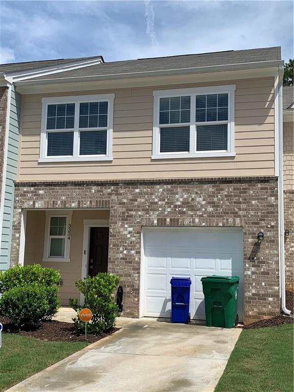 3334 Tarian Way Decatur, GA 30034 - Photo 1 of 1 a front view of a house with garden