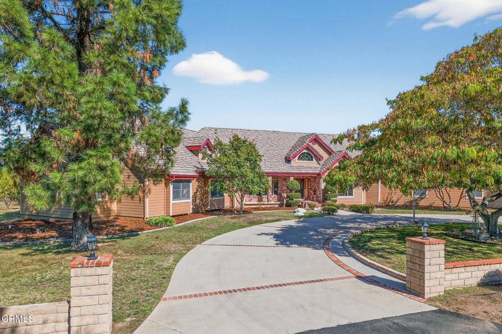 1125 Spring Street Oak View, CA 93022 - Photo 2 of 73 a front view of a house with a yard