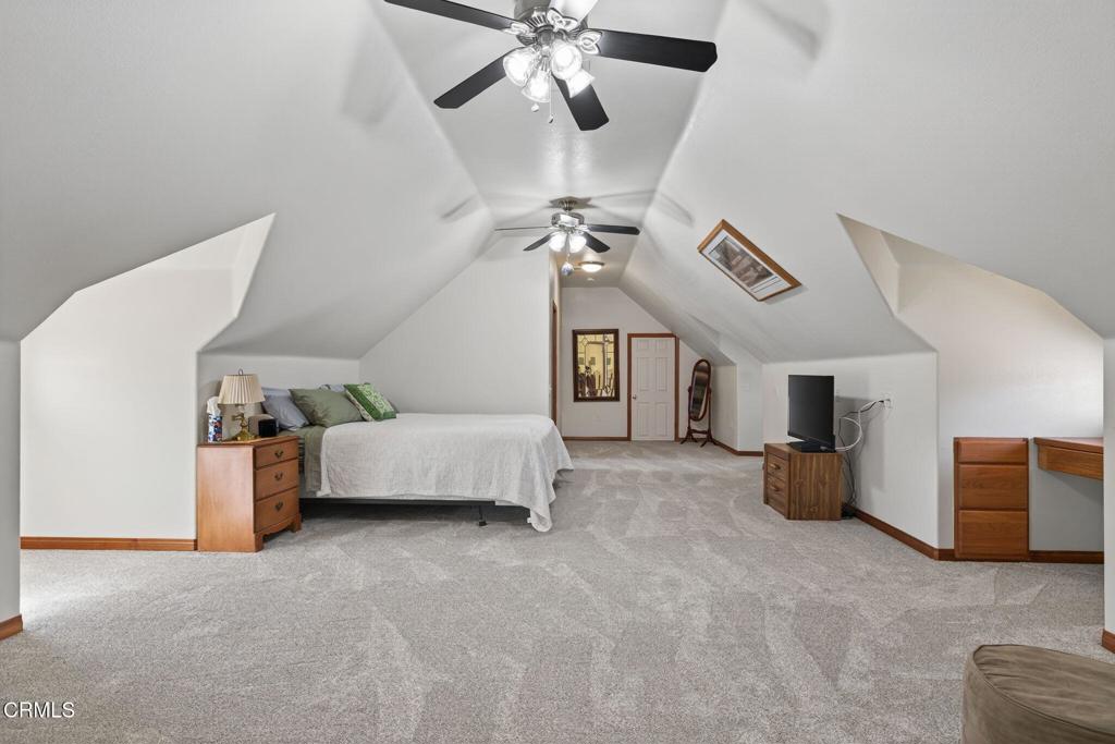 1125 Spring Street Oak View, CA 93022 - Photo 40 of 73 a living room with furniture and a chandelier