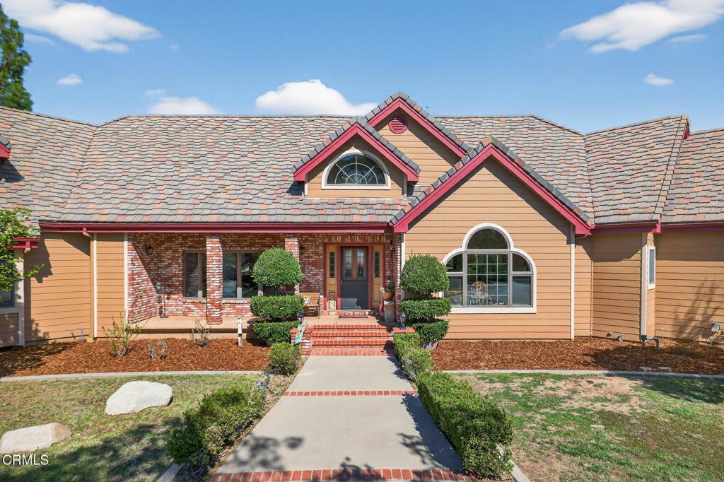 1125 Spring Street Oak View, CA 93022 - Photo 4 of 73 a front view of a house with garden