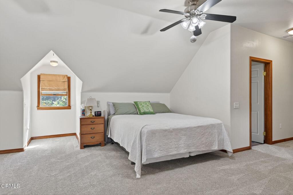1125 Spring Street Oak View, CA 93022 - Photo 41 of 73 a spacious bedroom with a bed and a window