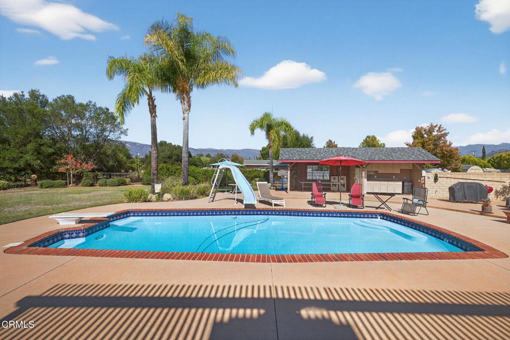 1125 Spring Street Oak View, CA 93022 - Photo 52 of 73 a view of a house with swimming pool and sitting area