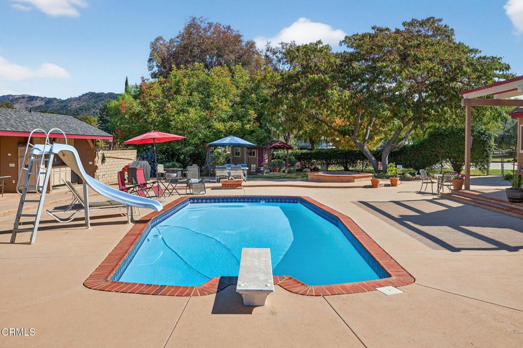 1125 Spring Street Oak View, CA 93022 - Photo 53 of 73 a swimming pool with outdoor seating and yard
