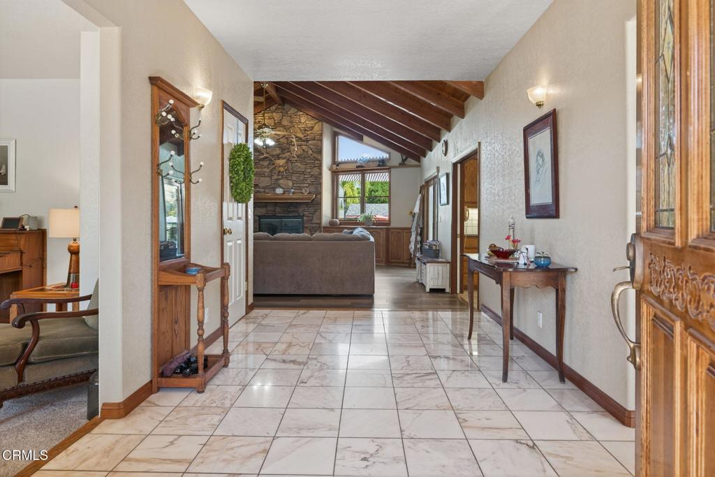 1125 Spring Street Oak View, CA 93022 - Photo 6 of 73 a view of living room filled with furniture and large windows