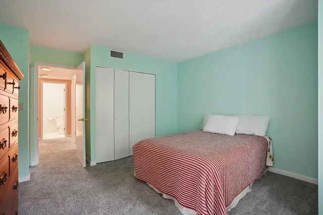 a bathroom with a toilet and a sink
