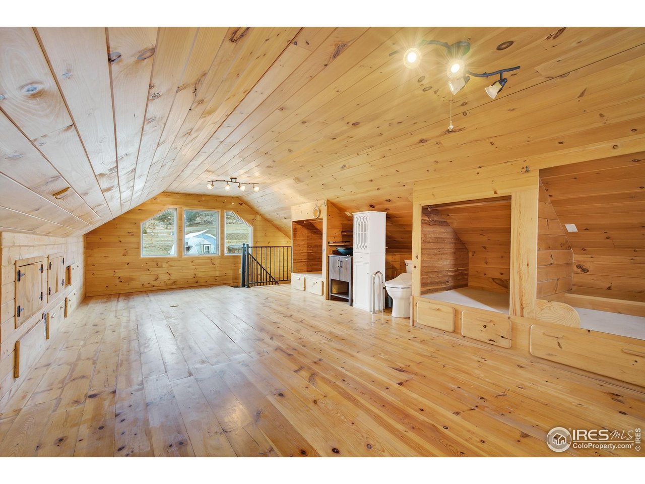 2848 Slater Creek Road Guffey, CO 80820 - Photo 17 of 50 UPSTAIRS MAIN BEDROOM