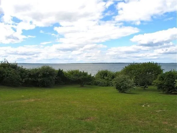 a view of a lake with a building